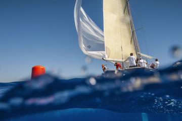 sailboat viewed partially from underwater