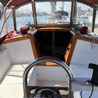 a chair sitting in front of a window