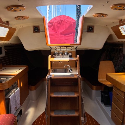 a laptop computer sitting on top of a table